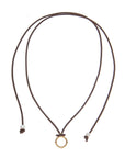 Brown suede cord with gold ring to attach pendant. Cord ends have pearl details.
