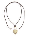 Leather lariat with a full heart pendant attached