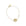 Gold chain bracelet featuring mini coin with illustration of the sun, waves, and a heart with pink tourmaline accent on chain