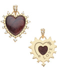 Front and back of love dolce carved heart pendant. Back shows gold setting with arrow detail and the word LOVE.