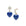 Drop earrings feature mismatched star and moon stud with mother of pearl accents and then lapis heart drops on both