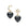 Drop earrings feature onyx heart drop and mismatched star and crescent moon studs with mother of pearl cabochon details