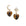 Drop earrings feature tiger's eye heart drop and mismatched star and crescent moon studs with mother of pearl cabochon details