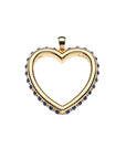 Gold open heart pendant featuring lapis cabochons on the outer edge