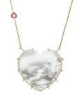 Carved mother of pearl heart pendant with pink tourmaline accent on chain