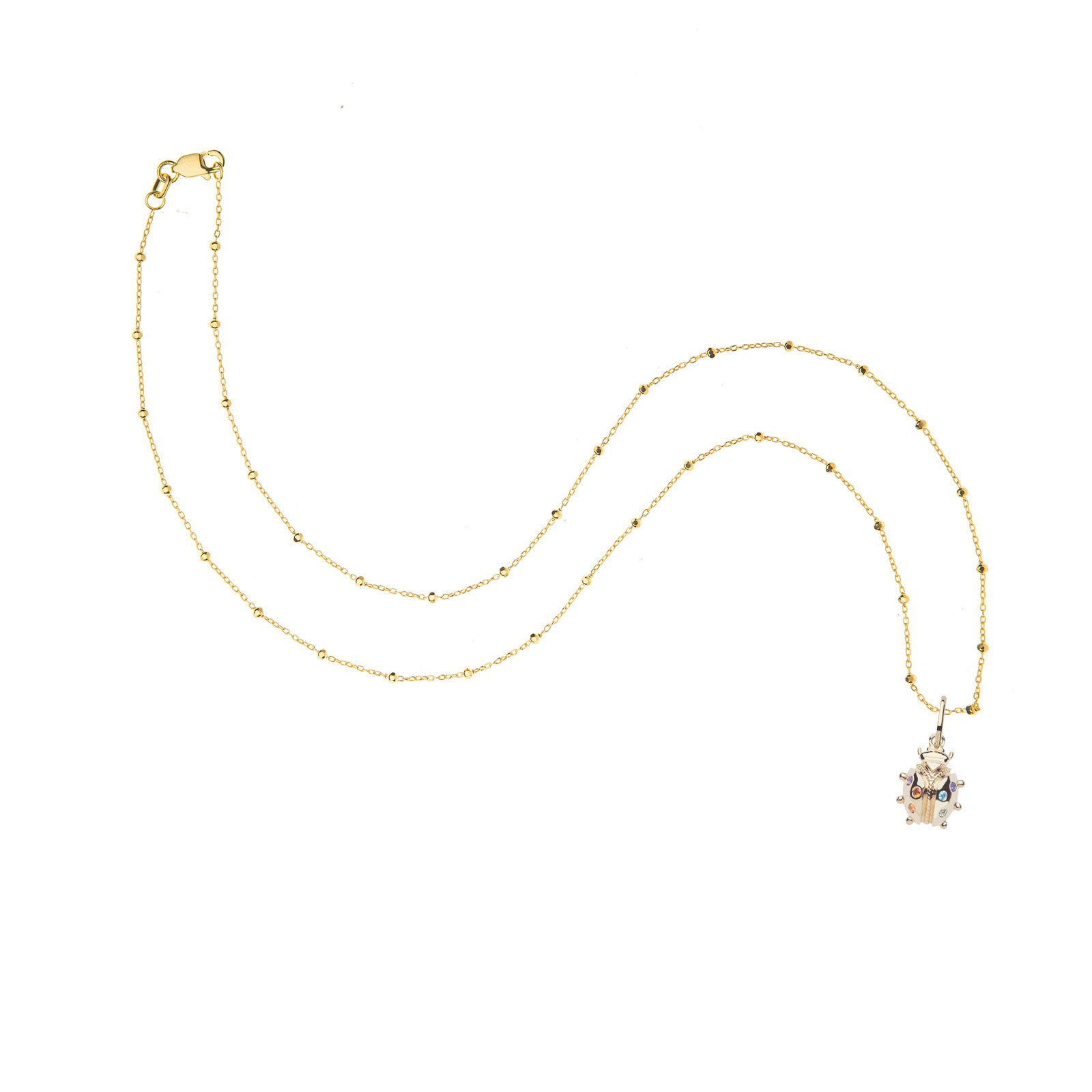 Gold ladybug pendant on 14 karat satellite chain