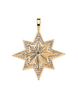 Gold 8 point star pendant features blue sapphire center stone and white topaz border