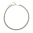 Gold tennis necklace features heart shaped black CZ stones