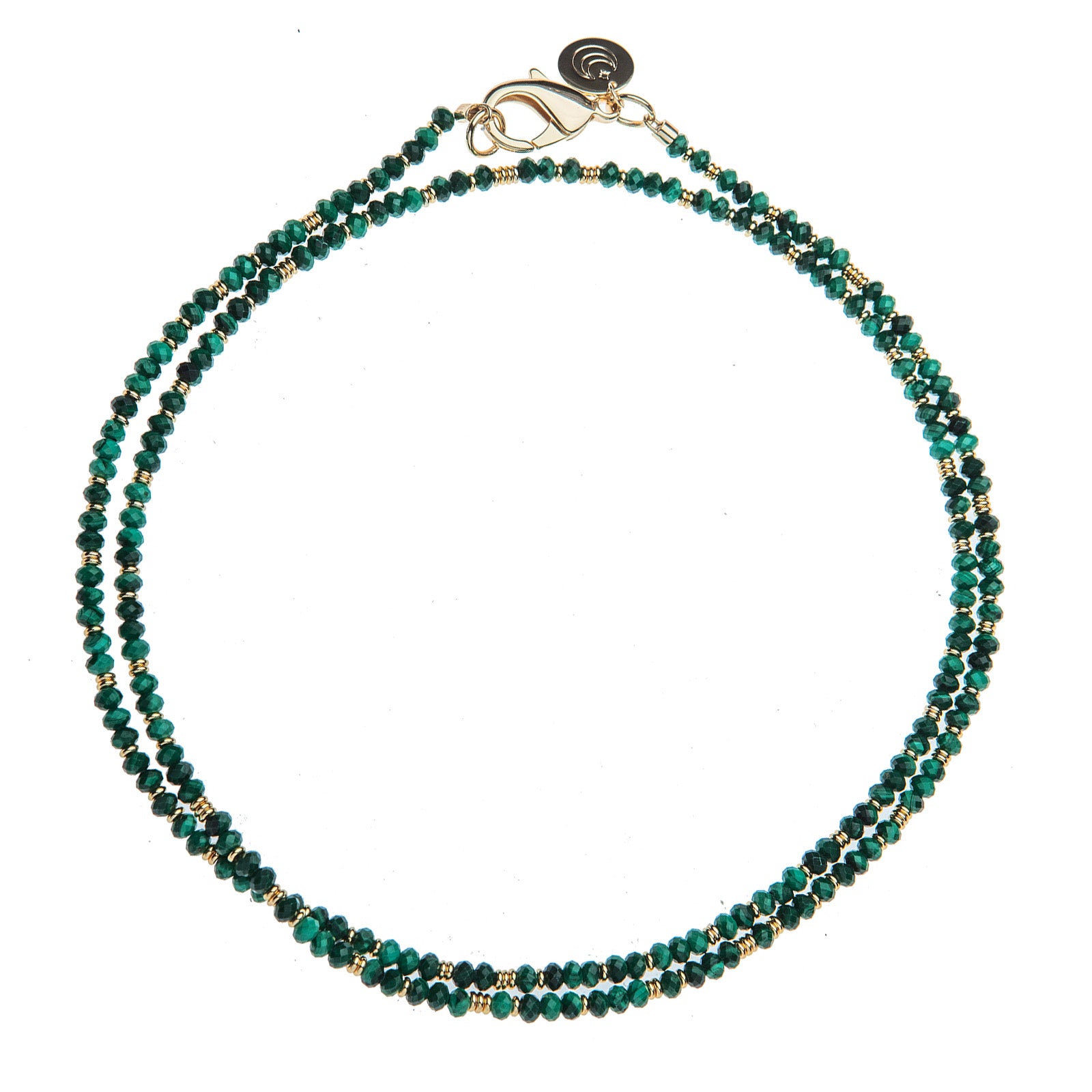 Double wrapped beaded necklace featuring malachite beads and flat gold beads. Necklace features oversized gold lobster clasp.