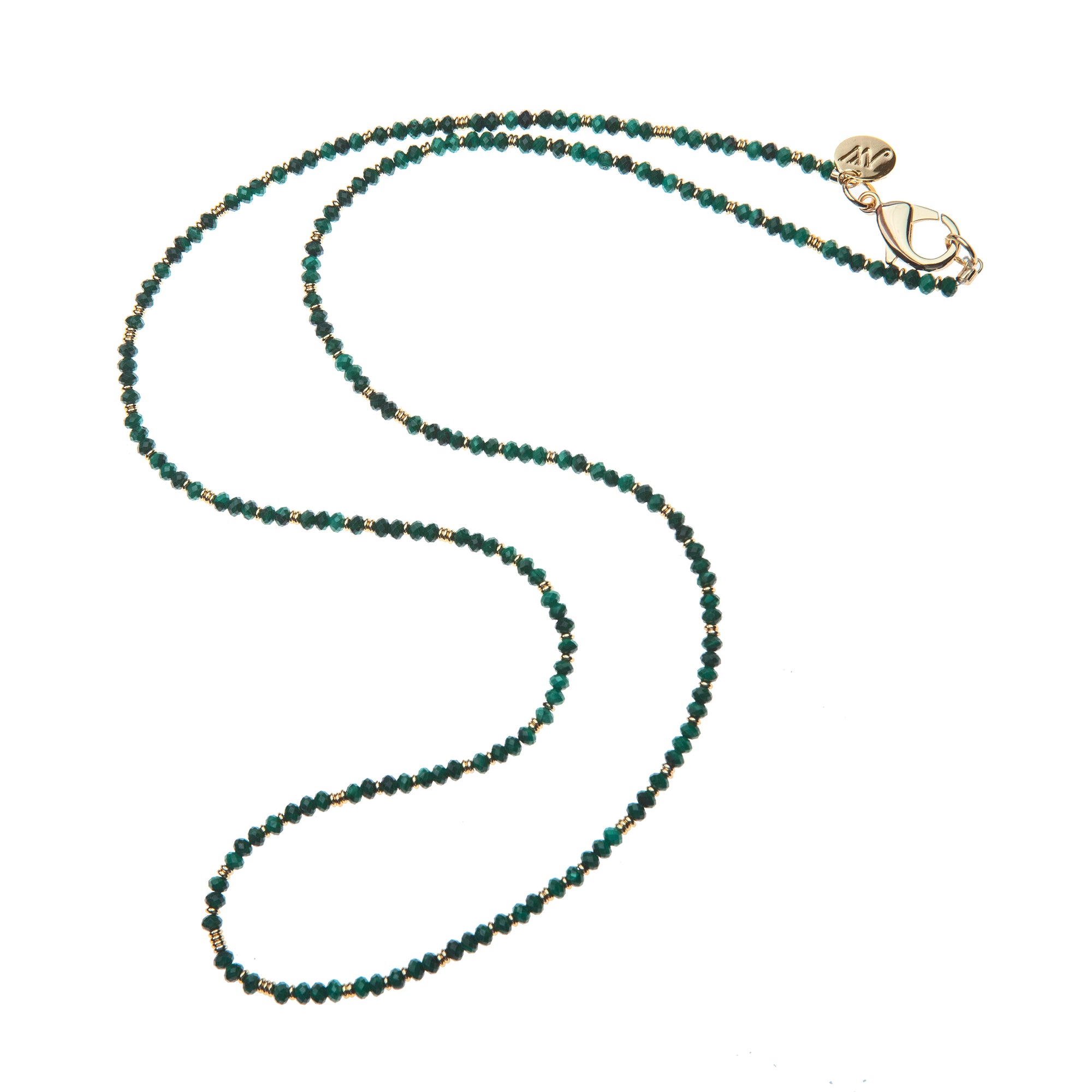 Beaded necklace featuring malachite beads and flat gold beads.