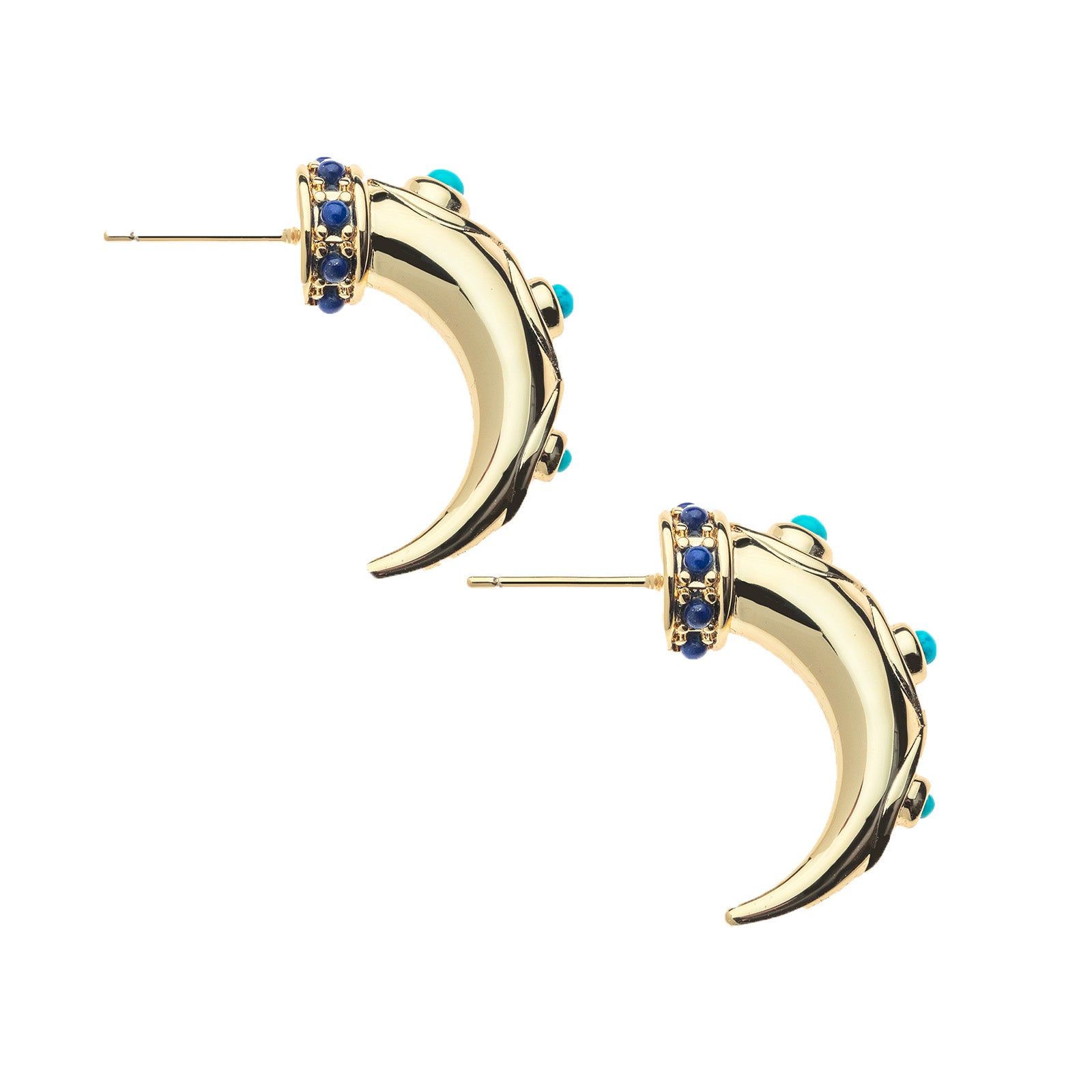 Side view of gold tusk inspired hoops. Hoops feature lapis cabochons at the base and turquoise cabochons along the hoop.