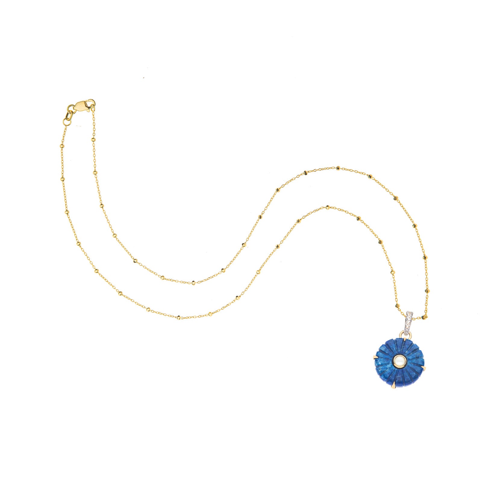 Carved lapis evil eye pendant on 14 karat beaded satellite chain
