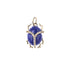 Carved lapis scarab pendant with white topaz accents and gold legs and bail