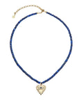 Lapis beaded necklace featuring gold evil eye full heart pendant with blue sapphire accent
