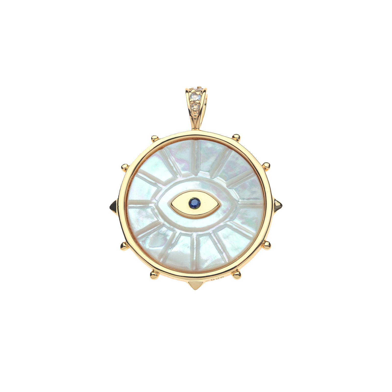 Gold coin pendant features carved mother of pearl surface with evil eye motif accented with blue sapphire and white topaz