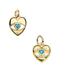 Front and back of protect hold my heart pendant. Back features the phrase GARDEZ BIEN
