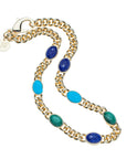Gold curb chain with scarabs carved in lapis turquoise, and malachite