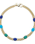 Gold curb chain featuring scarabs carved into lapis, turquoise, and malachite stones