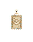 Gold spade playing card pendant features embellished edge with blue and white topaz and evil eye design in the center
