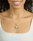Model wearing the strong supernova pendant on the classic rolo chain