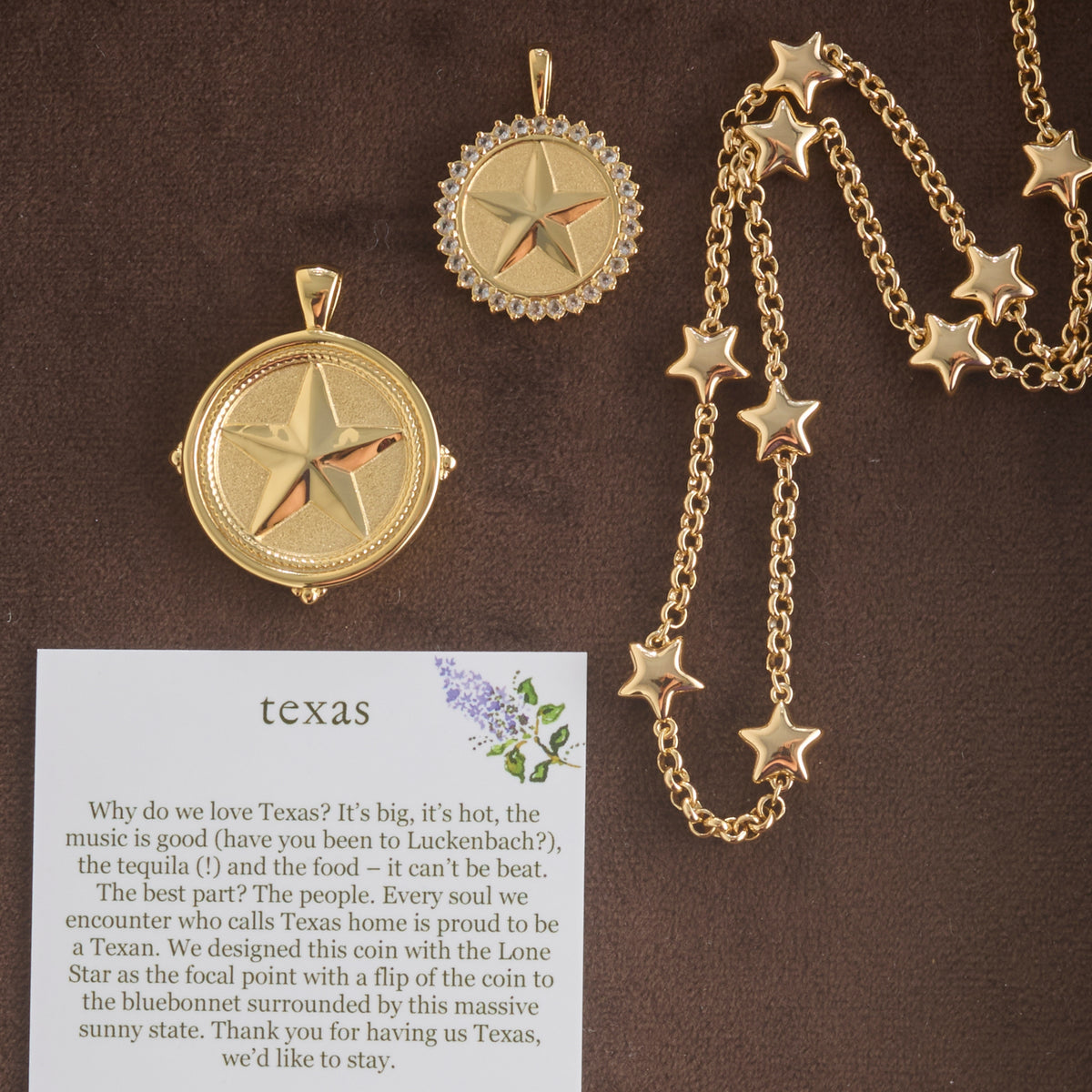 Stylized shot of the Texas coin, Texas petite embellished coin, and the pieces of a star chain