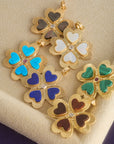 Stylized shot of six different colors of the lucky in love clover pendant