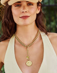 Model wearing the curb chain lariat with the lucky bonne chance coin pendant