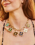 Model wearing six different color lucky in love clovers on the latch on to me chain