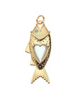 Gold fish pendant features blue topaz eye and mother of pearl heart inlay on the body