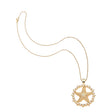 Gold starfish cutout coin on the classic rolo chain