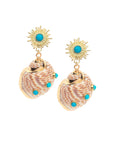 Earrings feature gold sun stud with turquoise center and hermit crab shell drops embellished with turquoise cabochons