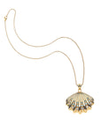 Strong in the waves shell pendant on the classic rolo chain