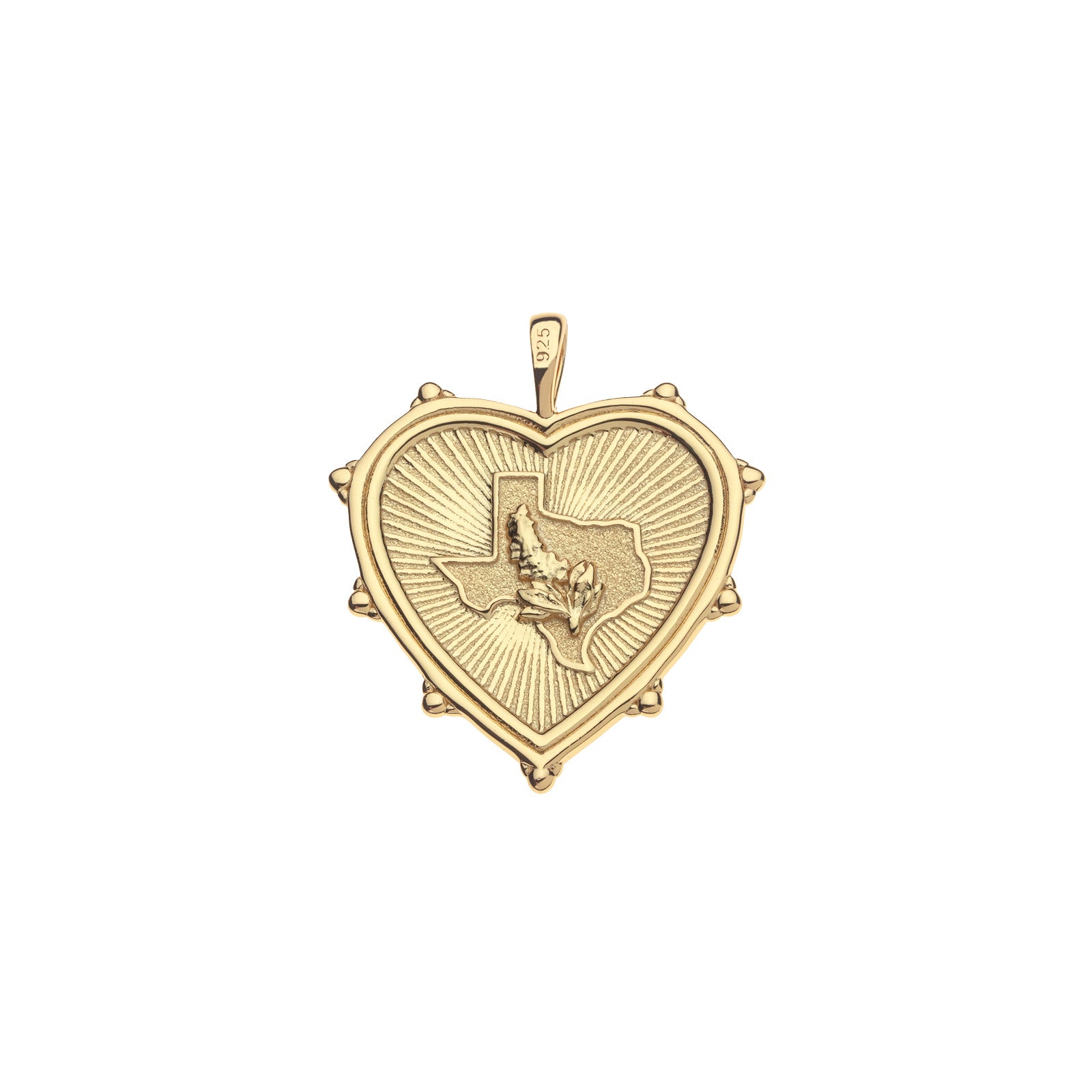 Back of gold heart pendant features outline of the state of Texas and a blue bonnet flower