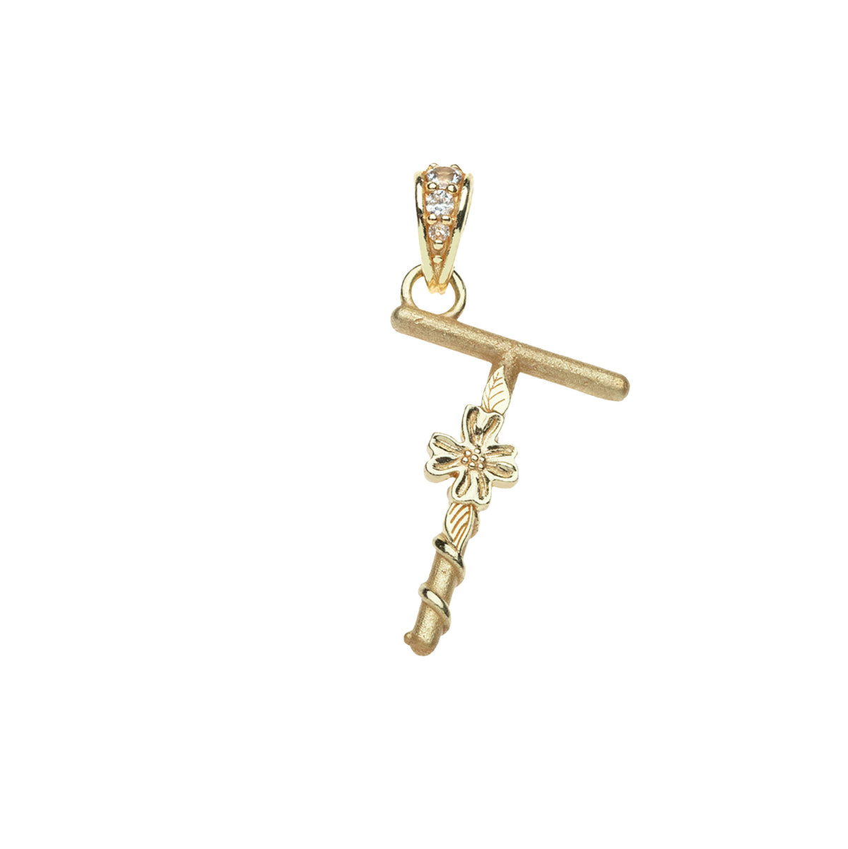 Gold letter T pendant with flower detail and white topaz accents on the bail