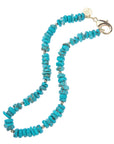 Beaded turquoise necklace with gold bead  accents and oversized gold clasp