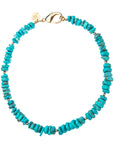 Beaded turquoise necklace with gold bead accents and oversized gold clasp