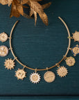 Gold neck cuff with each of the petite embellished coins