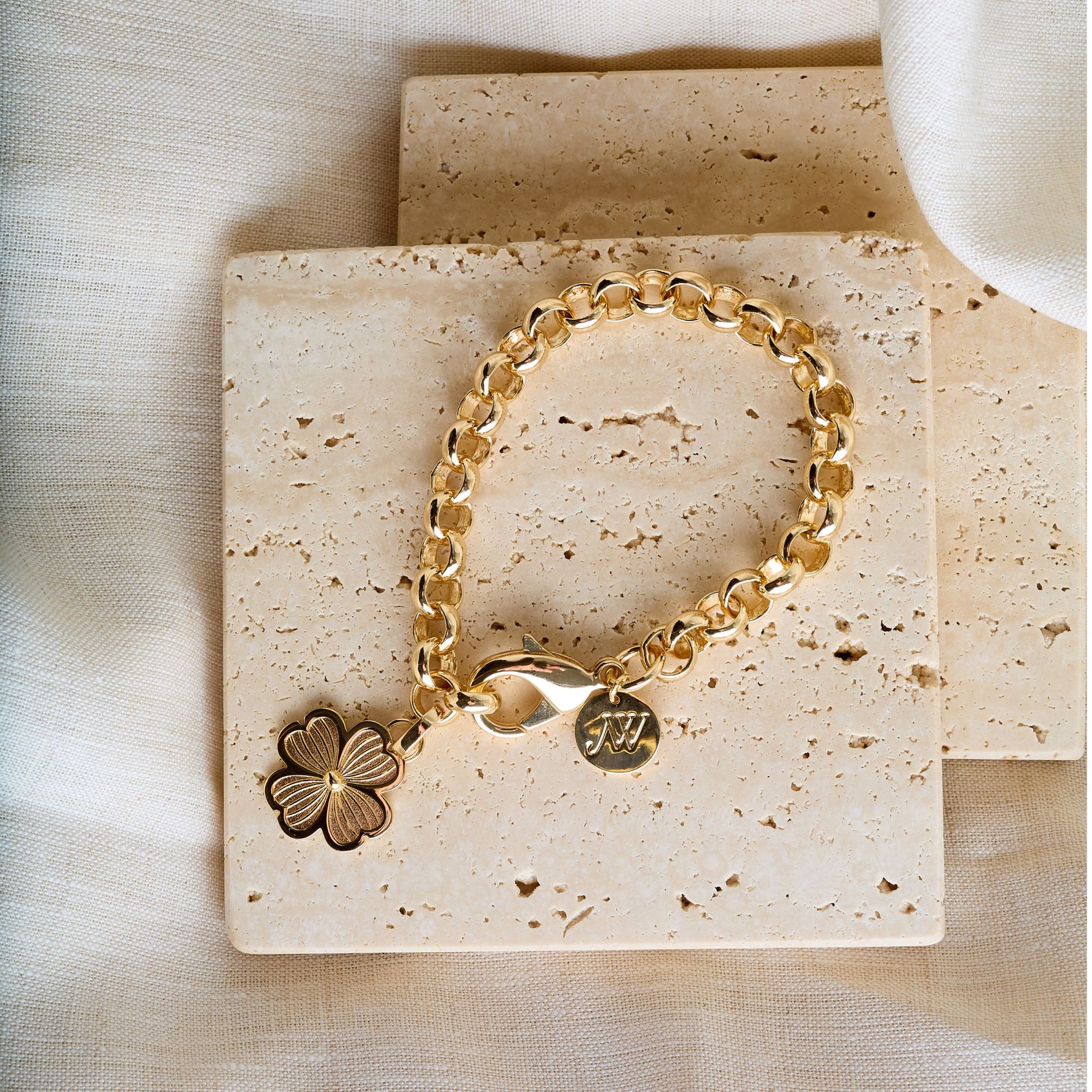 Gold chunky rolo chain bracelet with dogwood charm