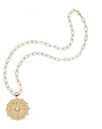 Gold wanderlust coin pendant on drawn link chain