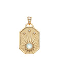 Gold dog tag pendant features sun design with mother of pearl cabochon as well as white topaz star details