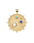 Gold coin pendant features celestial design of sun and stars with accents of mother of pearl, turquoise, lapis, and moonstone