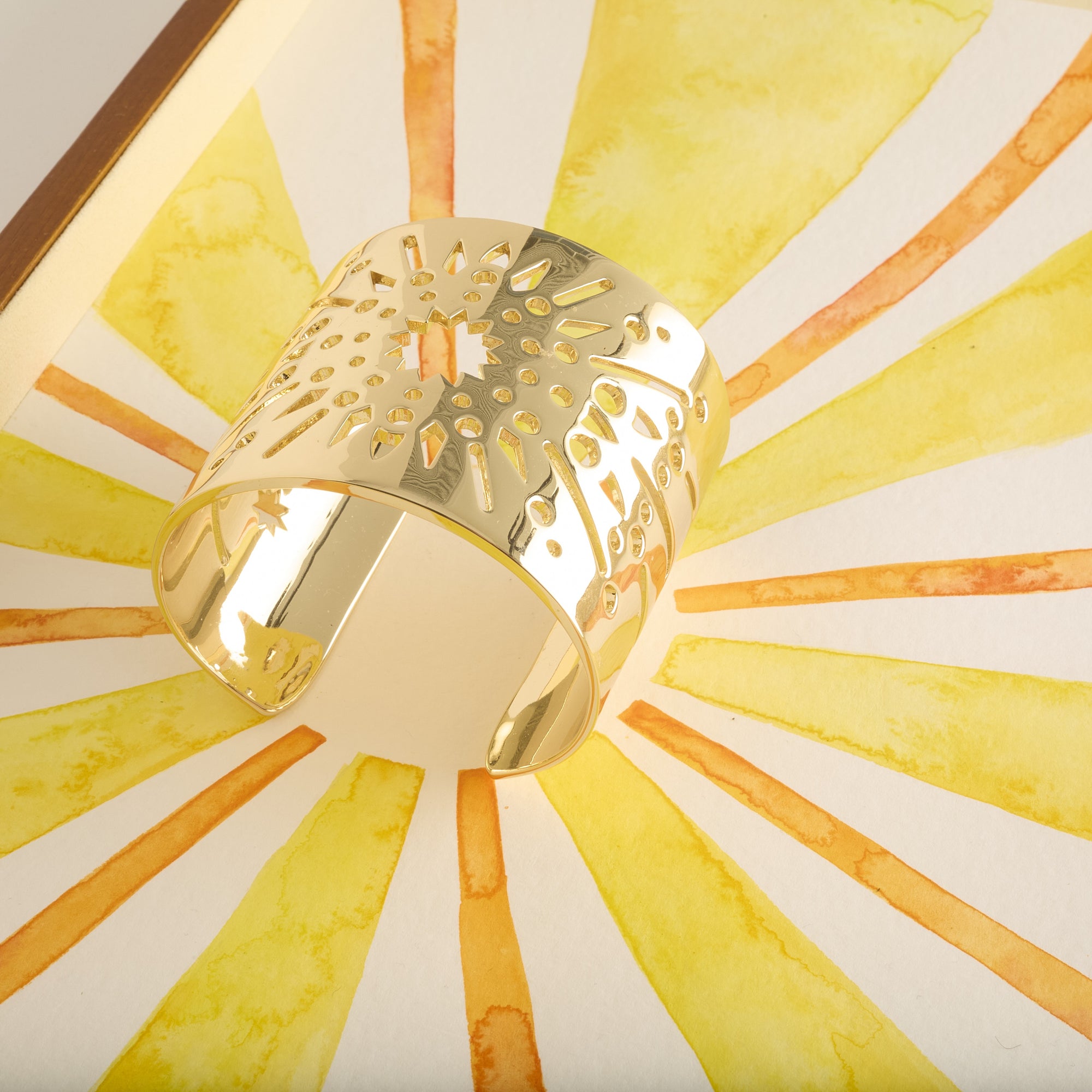 Stylized shot of strong supernova cuff on watercolor painting of sun rays