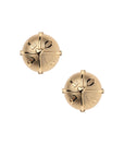 Round gold stud earrings feature a tiny heart in the center and the word LOVE around it